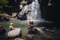 take a swim under the waterfall at living heritage koslanda